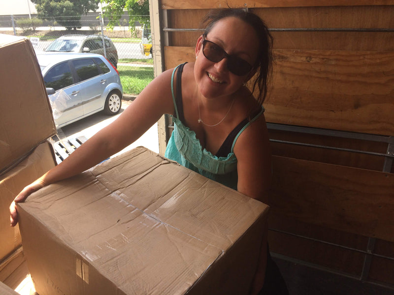Unpacking our first shipment ever
