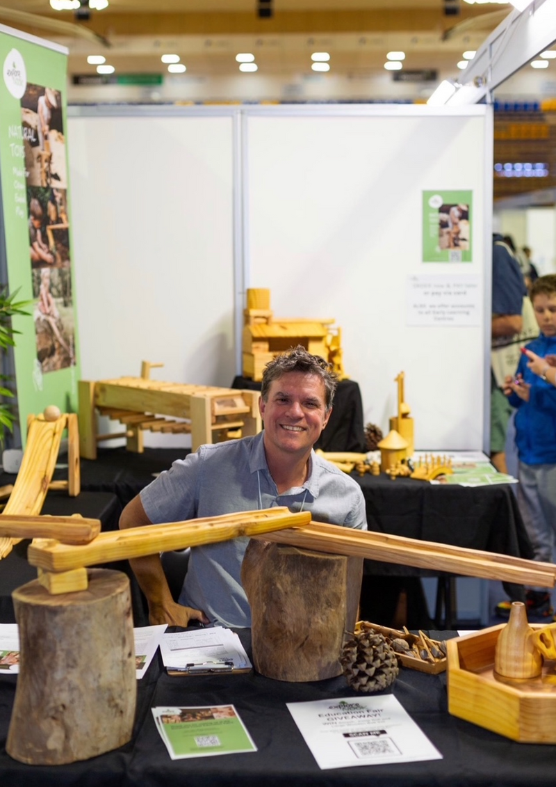 Jon with Explore Nook resources at a conference stand